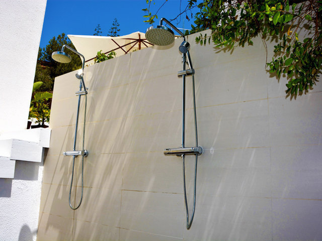 showers under the blue sky of the mediterranean villa in sitges