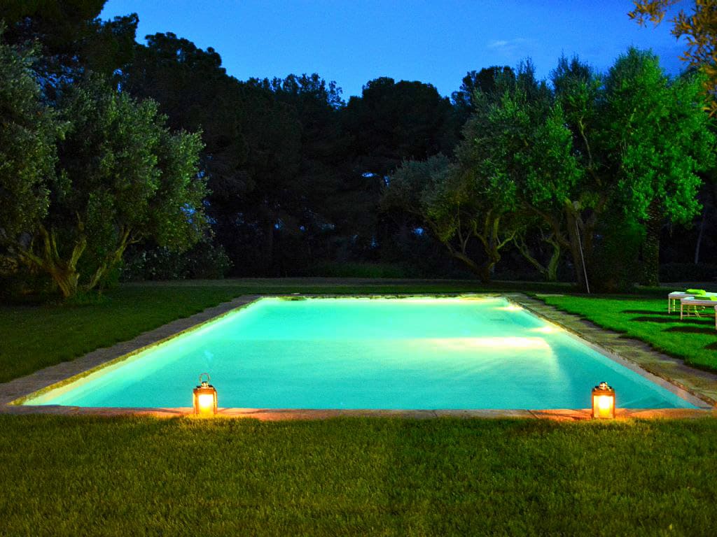 the pool of the spanish farmhouse by night