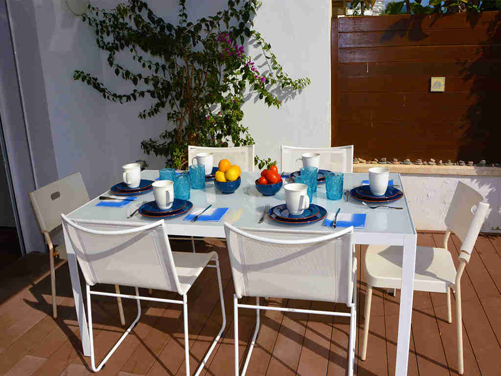 sitges apartments with pool and outdoor dining area