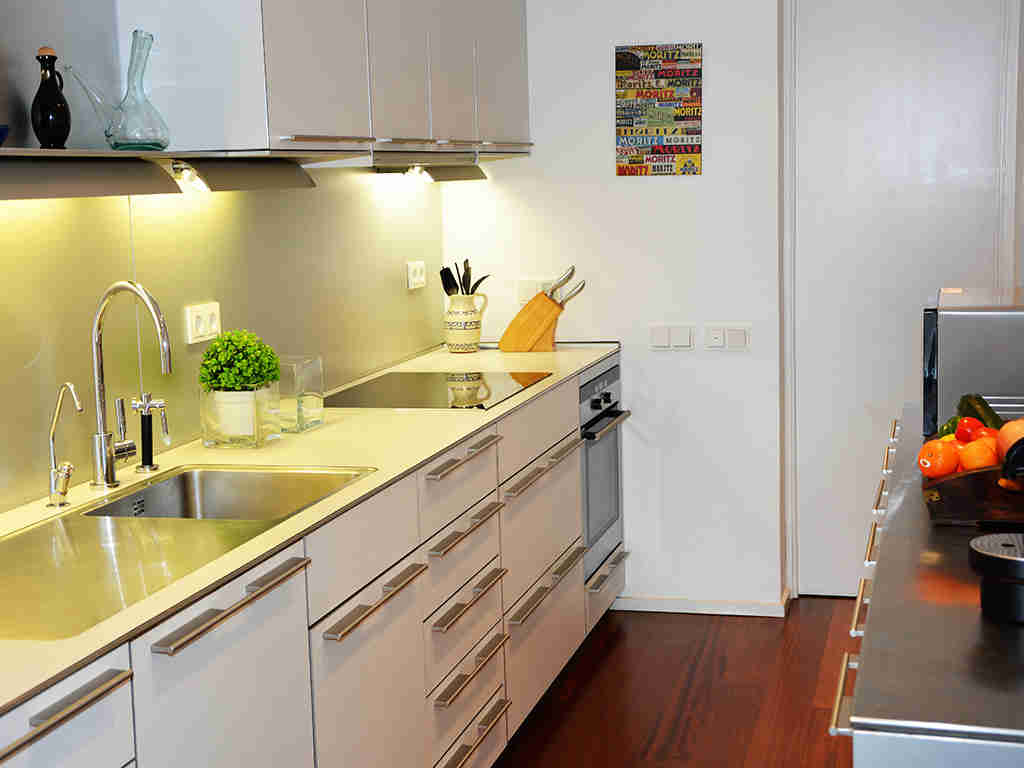 modern and well-equipped kitchen of the sitges apartments with pool
